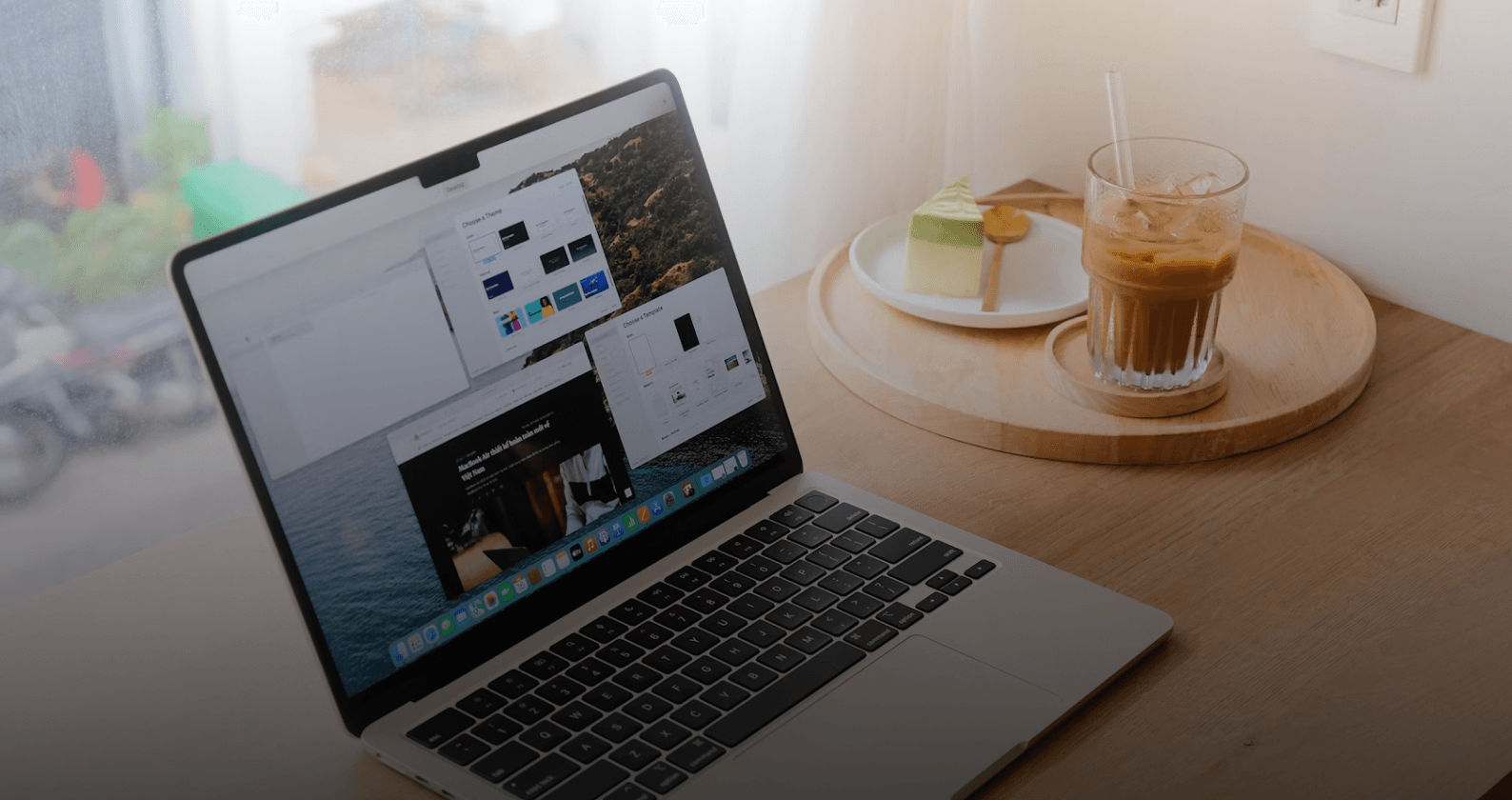 laptop and a cup of coffee on the table