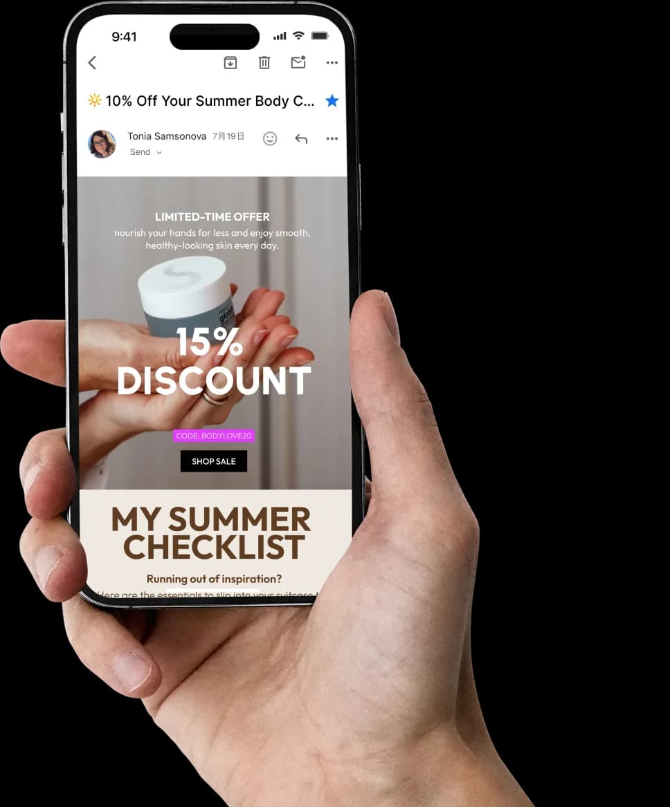 a hand holding an iphone with email marketing interface