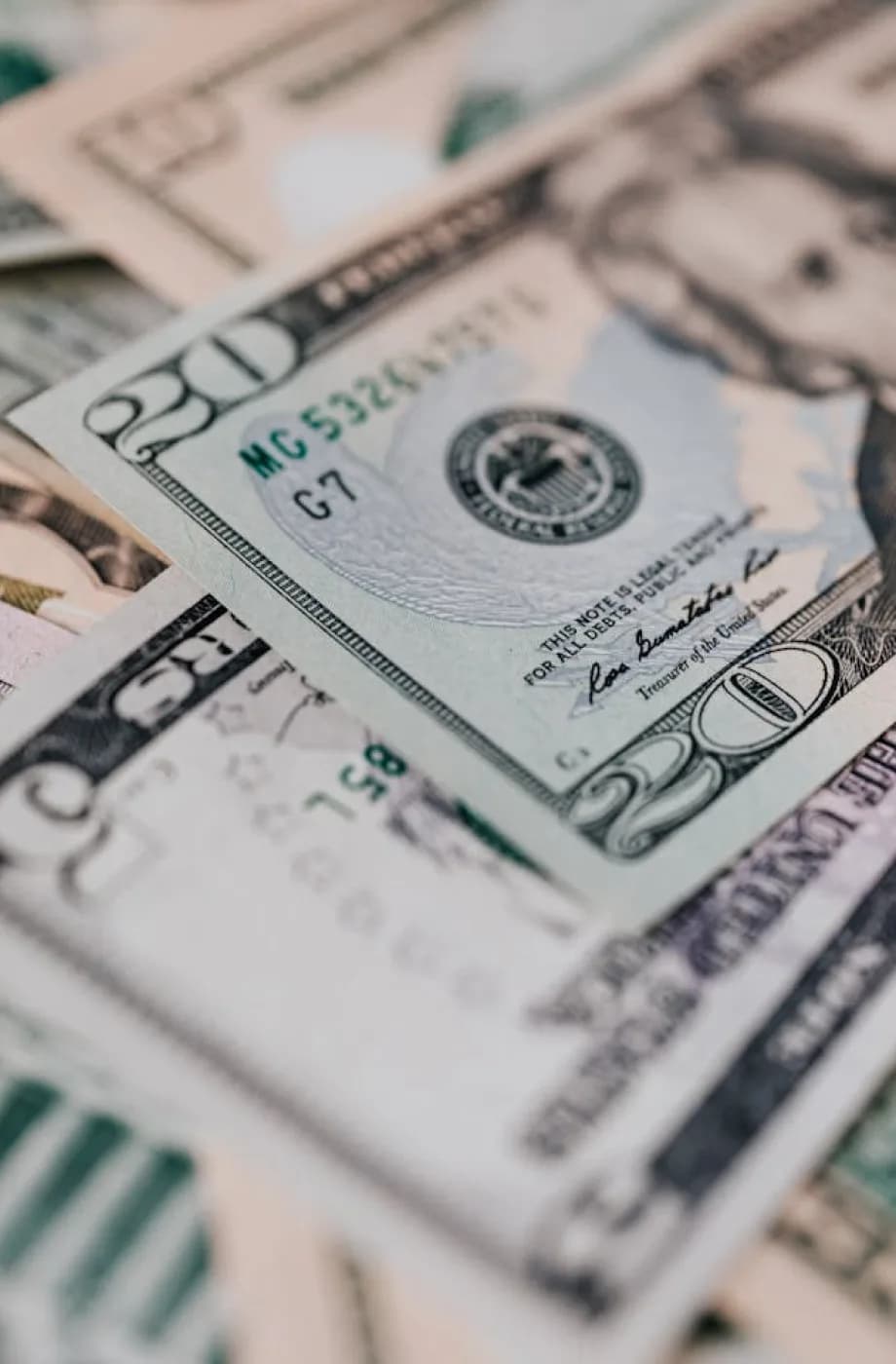 Close-up of U.S. dollar bills representing pricing, payments, or financial transactions